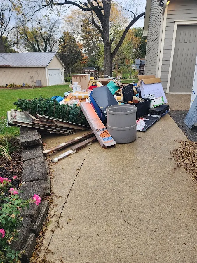 Dumpster being loaded with debris for 3 Yard Dumpster Rental in Zephyrhills South